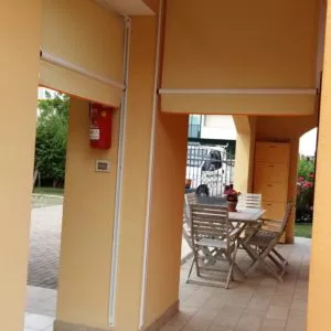 Tenda da sole a caduta con guide